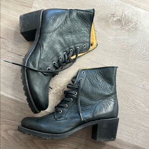 Black Combat Boots with Lace-Up Design and Chunky Heel